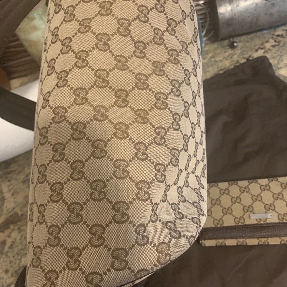 Gucci backpack and matching wallet new never used
